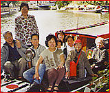 Elderly Club members enjoying an outing on a barge